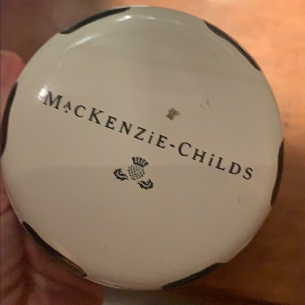 2- MacKenzie-Childs country check decor.